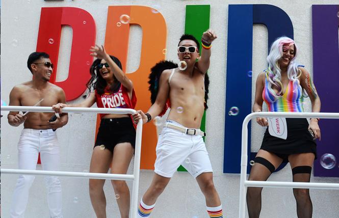 SF Pride parade participants danced on a float during the 2019 event. Photo: Rick Gerharter