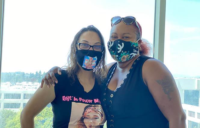 Vanessa Singh, left, the sister of Natalia Smüt Lopez, was at the July 28 court hearing in San Jose with her cousin, Aja Franco. Photo: John Ferrannini