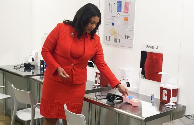 San Francisco Mayor London Breed checked out an injection station at the Safer Inside demonstration in August 2018 that was set up to show the public what a safe injection facility might look like. Photo: Liz Highleyman