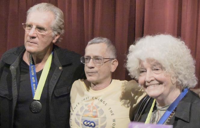 Former San Francisco 49er David Kopay, Roger Brigham, and the late Patricia Nell Warren were photographed at the 30th anniversary celebration of the Gay Games in West Hollywood in 2012. Photo: Courtesy Facebook
