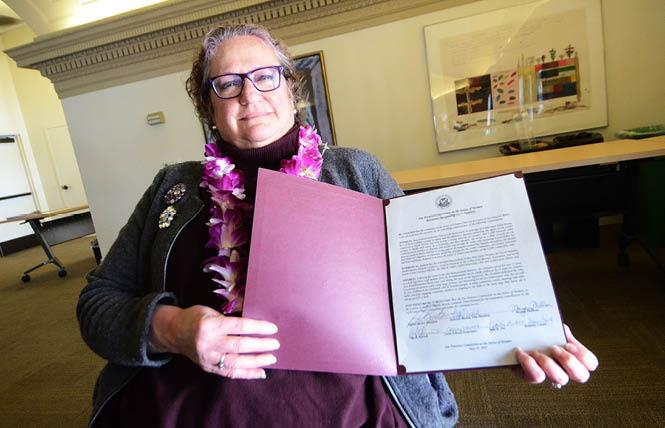 Anna Damiani holds her resolution of recognition from San Francisco's Commission on the Status of Women that was presented to her on May 17, 2017. Photo: Rick Gerharter