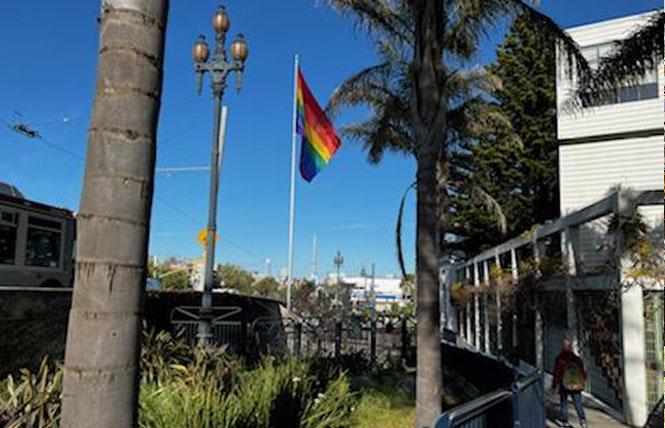 Historians are looking at city landmark status for the flagpole at Harvey Milk Plaza that flies the large rainbow flag that was created by the late Gilbert Baker specifically for that purpose. Photo: Matthew S. Bajko