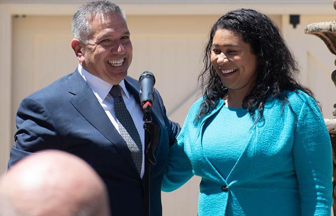 New District 6 Supervisor Matt Dorsey, left, is all smiles May 9 as Mayor London Breed swears him into office. Photo: Jane Philomen Cleland