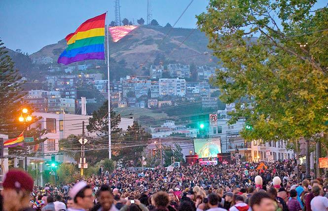 Pink Saturday drew a crowd in 2011, with the illuminated pink triangle on Twin Peaks in the background. Photo: Jane Philomen Cleland 