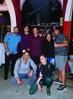 Héctor Collazo and Jeanny López, front, with painters and friends. IBA's JuanCarlos Gonzalez, center.  Photo by Michele Maniscalco