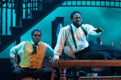Robert Cornelius as Bynum  and James Milord as Herald in August Wilson's "Joe Turner's Come and Gone" at The Huntington. (Courtesy :T Charles Erickson)