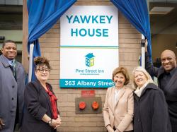 From Left to Right: Pine Street Inn dedicated its Women's Inn in Boston's South End today by unveiling "Yawkey House" in recognition of the Yawkey Foundation's transformational support. (L-R): Lorn Davis, Chair, Board of Directors, Pine Street Inn; Lyndia Downie, President and Executive Director, Pine Street Inn; Maureen H. Bleday, CEO and Trustee, Yawkey Foundation; Debra M. McNulty, Trustee, Yawkey Foundation; Reverend Dr. Ray Hammond, Trustee, Yawkey Foundation.