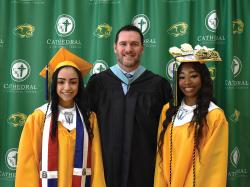 Salutatorian, Carolyn Then-Castillo, president Dan Carmody, and valedictorian Laura Agblekpe. Photo by Patrick O'Connor.