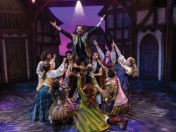 Jared Troilo (top, center) as William Shakespeare with cast members of Lyric Stage's revival of  "Something Rotten!" Photo courtesy of Nile Hawver.