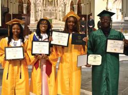 Award winners Arriana Wright (Covenant award), Shammelle Jean-Louis (Vigor in Arduis award), Tamia Darling (Spirit award) and Clarck Charlotin (Service award). Photo by Patrick O'Connor.